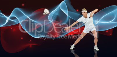 Composite image of badminton player playing badminton