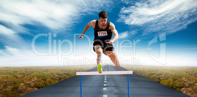 Composite image of sportsman practising hurdles