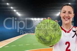 Sportswoman holding a ball