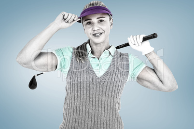 Composite image of pretty blonde playing golf