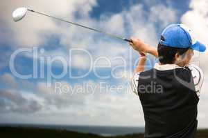 Focused man playing golf