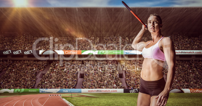 Composite image of female athlete throwing a javelin