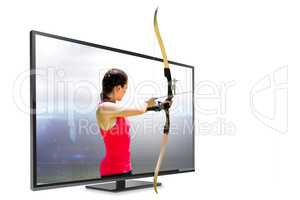 Composite image of side view of woman practicing archery