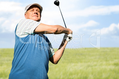 Composite image of view of a man playing golf