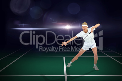 Composite image of badminton player playing badminton