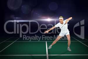 Composite image of badminton player playing badminton