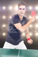 Composite image of confident male athlete playing table tennism