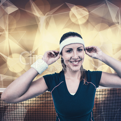 Composite image of female athlete wearing headband and wristband