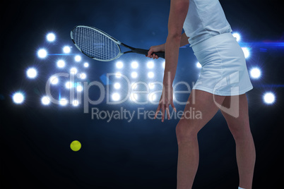 Composite image of athlete playing tennis with a racket