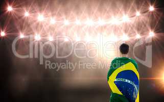 Rear view of Brazilian sportsman against flash light