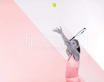 Athlete serving with her tennis racket