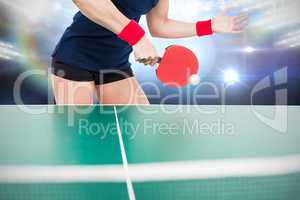 Composite image of ping pong player hitting the ball