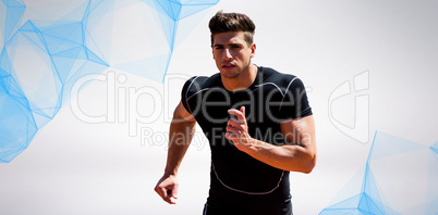 Composite image of athletic man jogging against white background