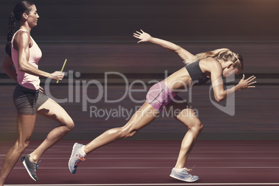 Composite image of sporty woman running