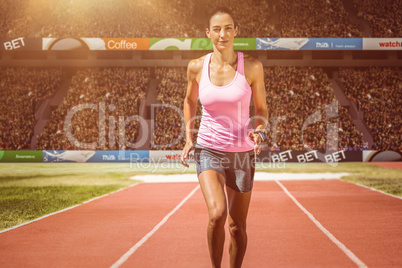 Composite image of facing view of woman running against white ba