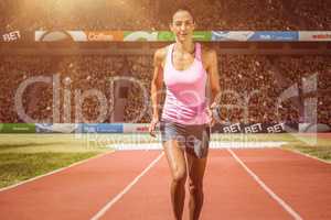 Composite image of facing view of woman running against white ba