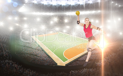 Female athlete with elbow pad throwing handball