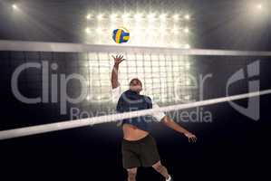Composite image of sportsman playing volleyball