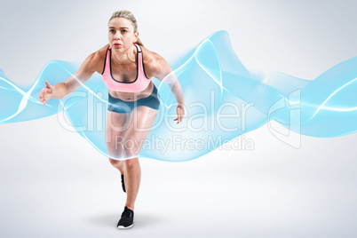Composite image of female athlete on the start line