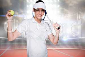 Composite image of female athlete holding a tennis racket and ball