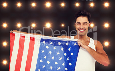 Composite image of athlete posing with american flag
