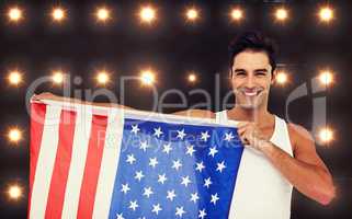 Composite image of athlete posing with american flag
