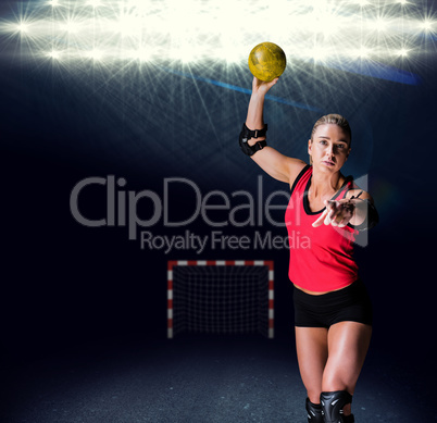 Composite image of female athlete with elbow pad throwing handba