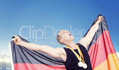 Composite image of athlete posing with olympic gold medals aroun