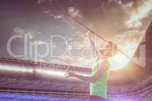 Composite image of athletic man throwing a javelin