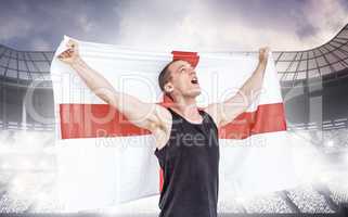 Composite image of athlete holding england national flag