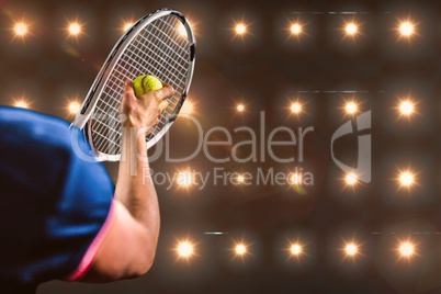 Composite image of tennis player holding a racquet ready to serv