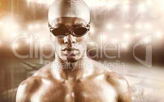 Composite image of swimmer posing with swimming goggles