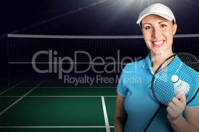 Composite image of badminton player holding badminton racket and