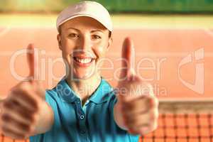 Composite image of sportswoman posing on black background