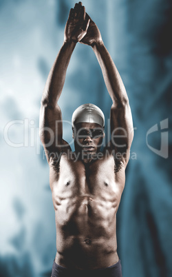 Composite image of swimmer ready to dive