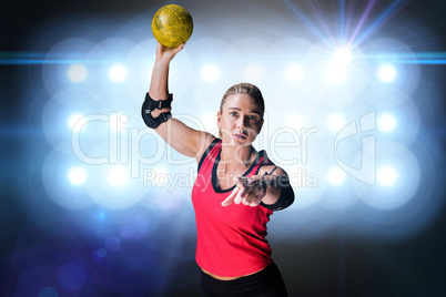 Composite image of female athlete with elbow pad throwing handba