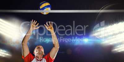 Composite image of sportsman throwing volleyball while playing