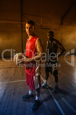 Portrait of two basketball players posing Portrait of two basketball players posing