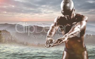 Composite image of swimmer ready to dive