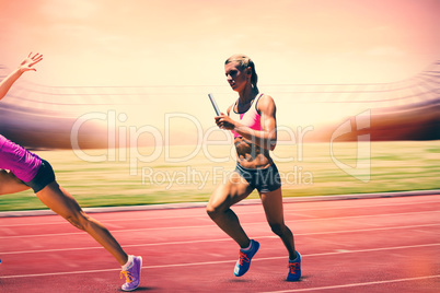 Composite image of athletic woman preparing to run