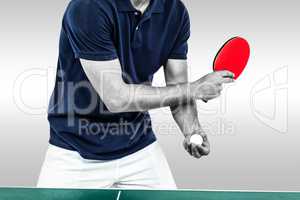 Composite image of mid section of athlete man playing table tenn