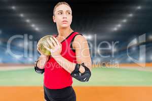 Composite image of female athlete with elbow pad holding handbal