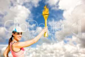 Composite image of happy woman raising a cup