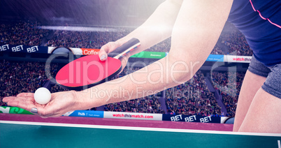 Composite image of female athlete playing table tennis