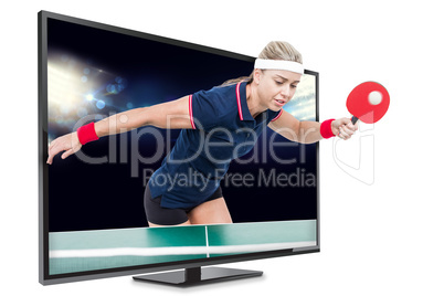 Composite image of female athlete playing ping pong