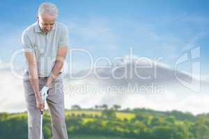 Composite image of man doing golf