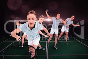 Composite image of pretty blonde playing badminton