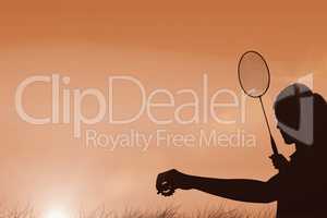 Composite image of female athlete holding a badminton racquet re