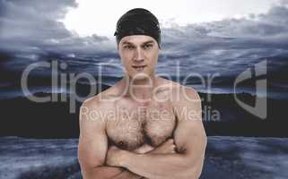 Composite image of portrait of swimmer posing with arms crossed