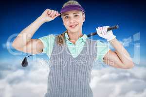 Composite image of pretty blonde playing golf